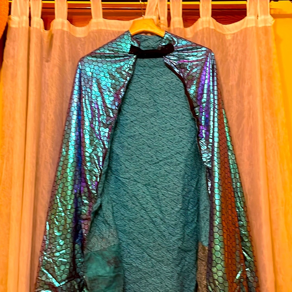 - shiny purple cosplay fabric in semi circle cape- fully lined- look fabulous
